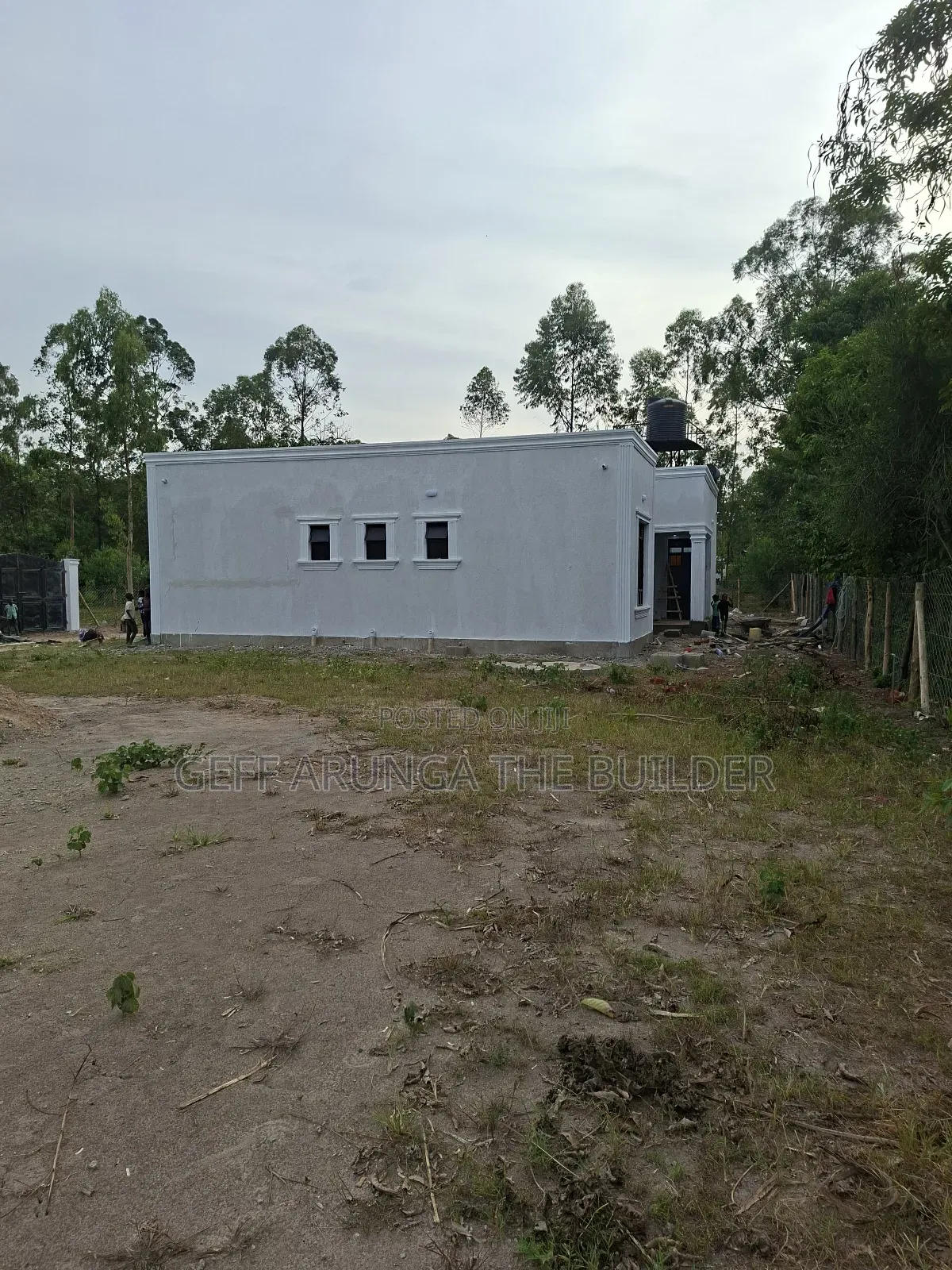 Construction of Modern Hidden Roofing 3 Bedroom House