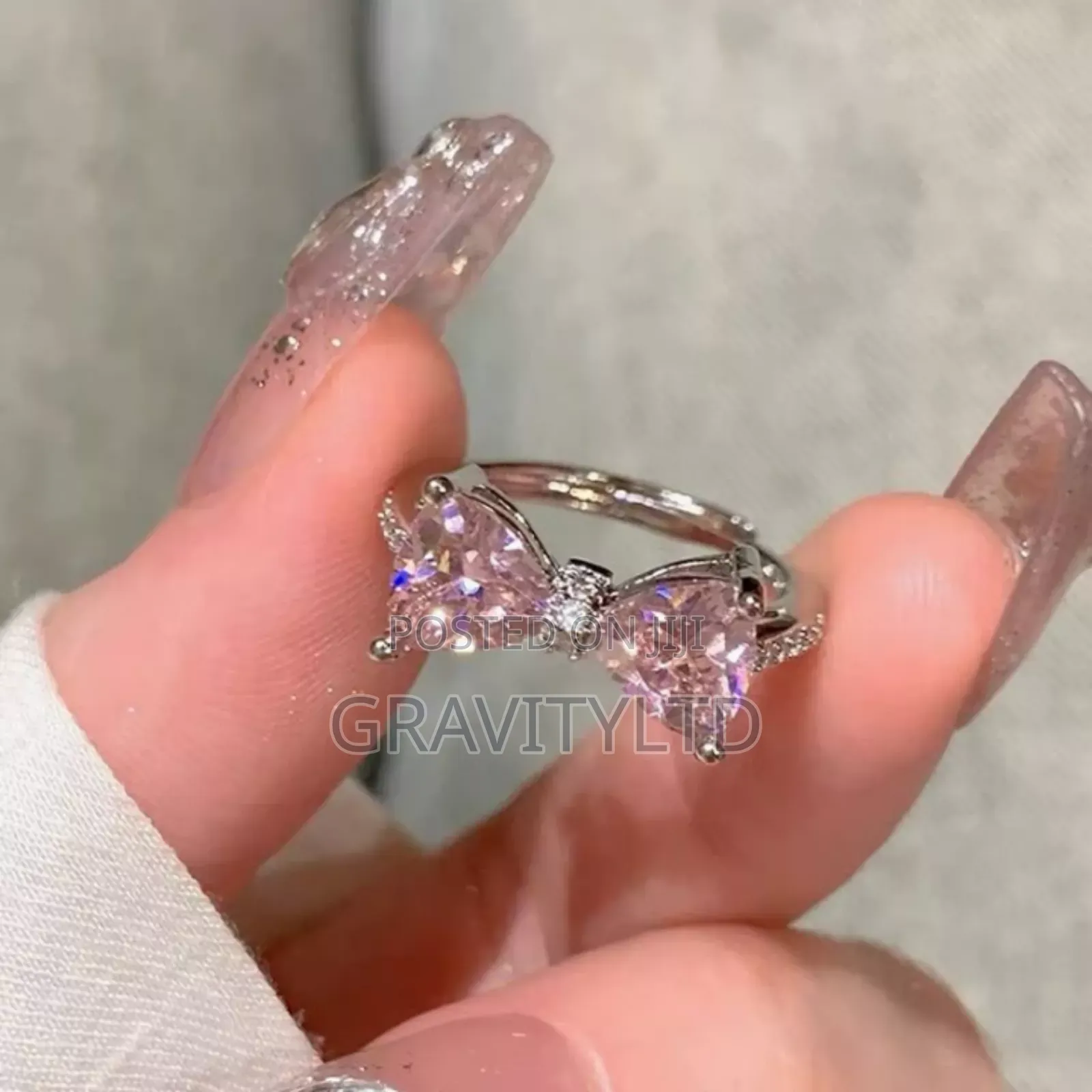 Elegant Adjustable Italian Silver Bow Ring With Pink Zircon Stones