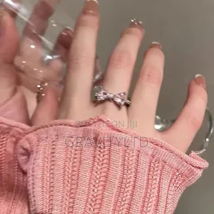 Elegant Adjustable Italian Silver Bow Ring With Pink Zircon Stones