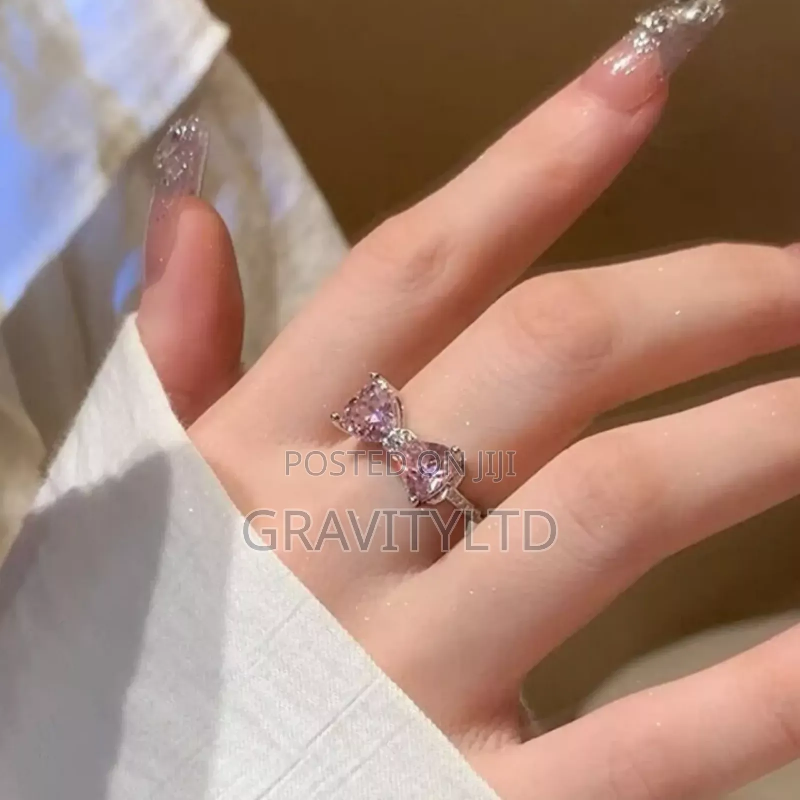 Elegant Adjustable Italian Silver Bow Ring With Pink Zircon Stones