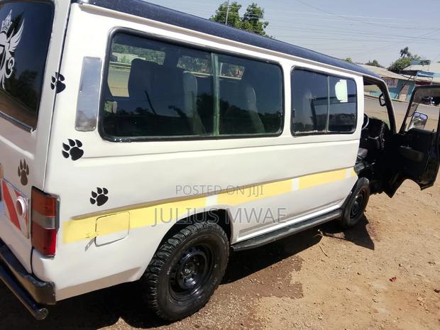 Nissan Caravan (Urvan) 2008 White - thumbnail 3