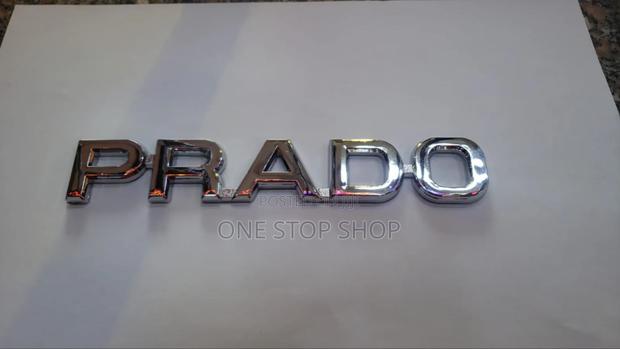 Chrome Prado Boot Letter Badge