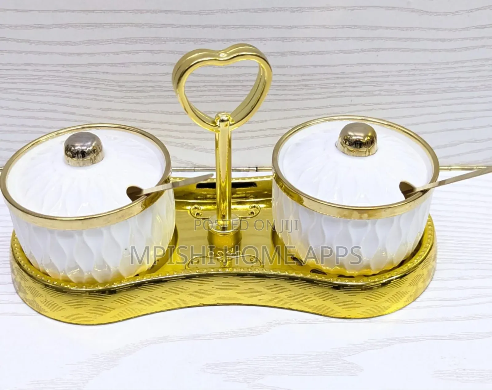 2-Piece Ceramic Sugar Dish Set With a Golden Stand.
