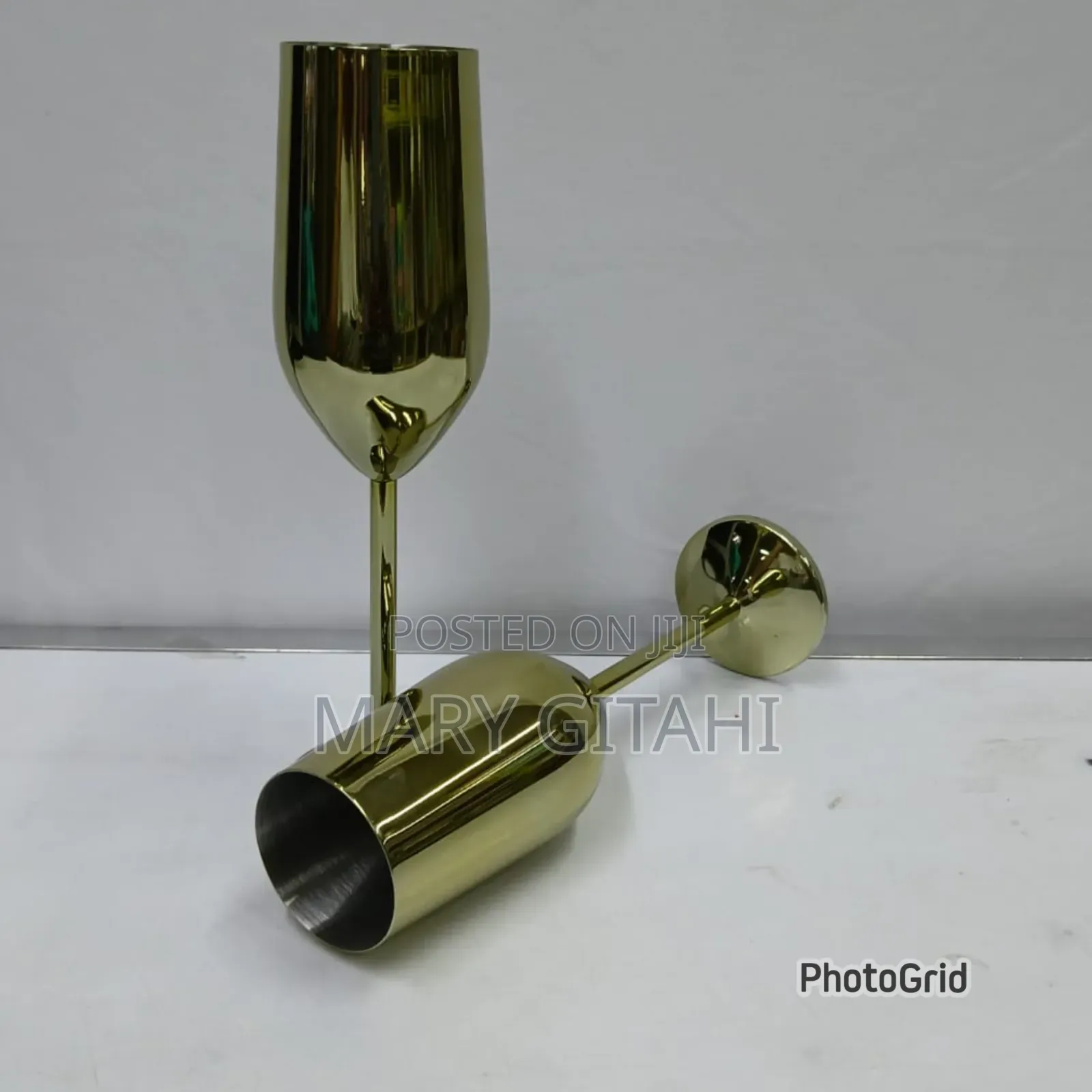 A Pair Of Gold Stainless Steel Wine Glass