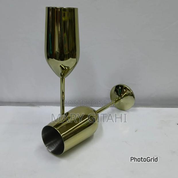 A Pair Of Gold Stainless Steel Wine Glass