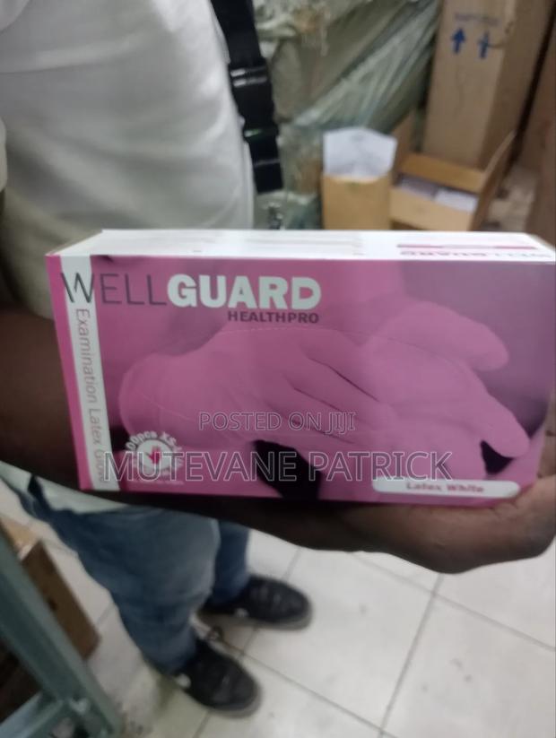 Latex Powdered Examination Gloves