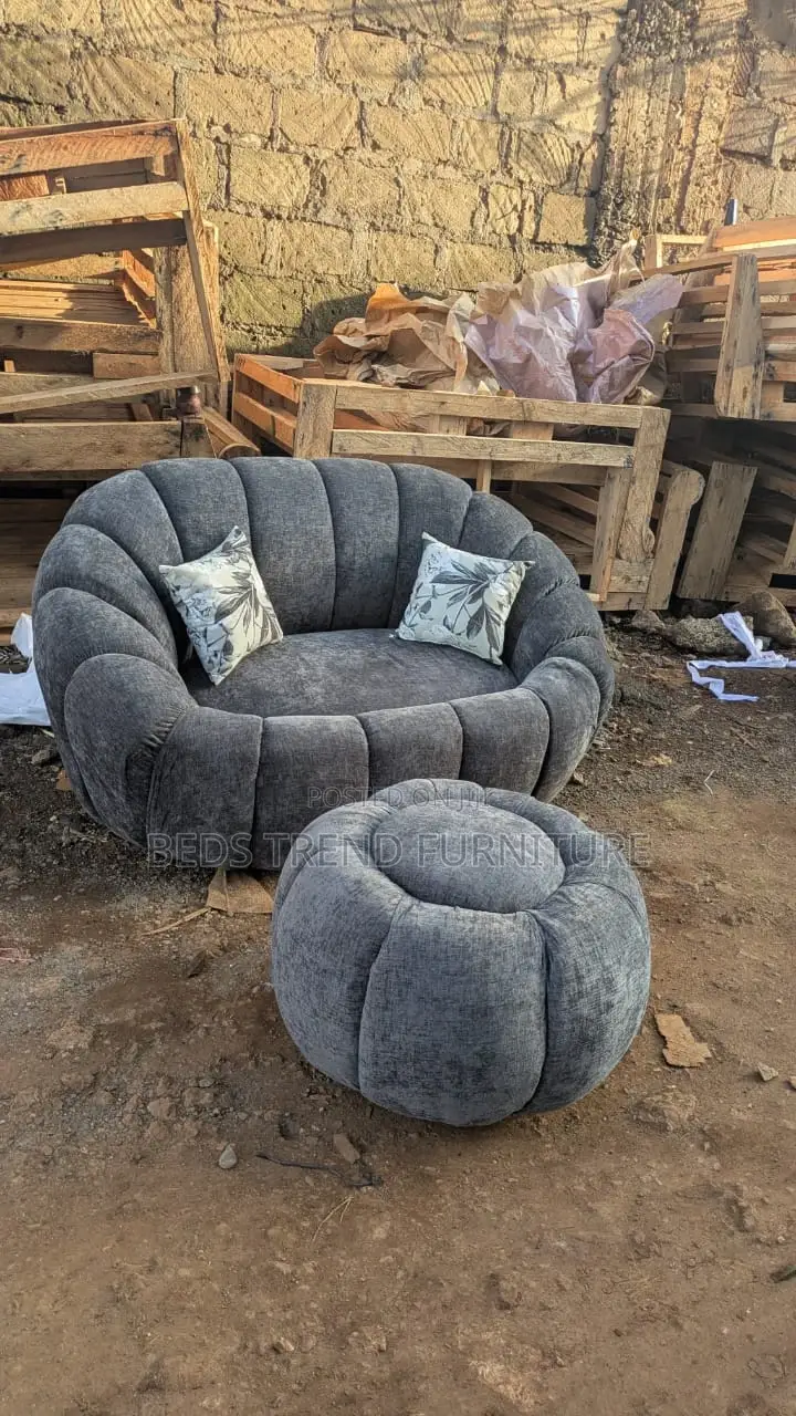 Gray Armchair With a Puff