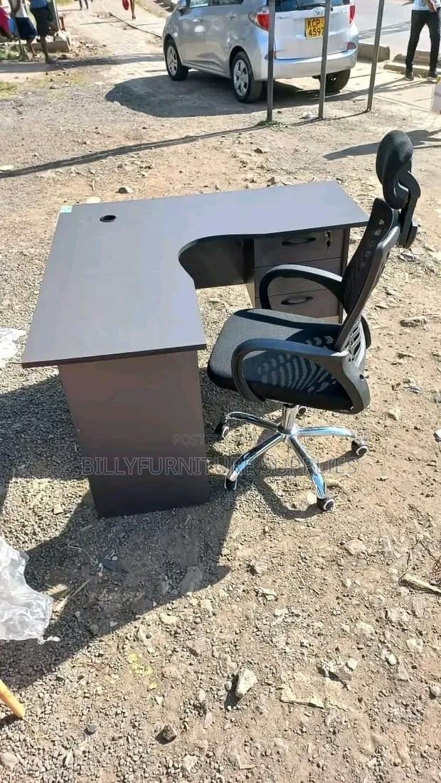 Grey L Shaped and Headrest Chair