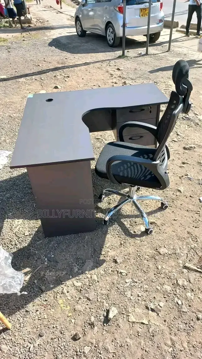 Grey L Shaped and Headrest Chair