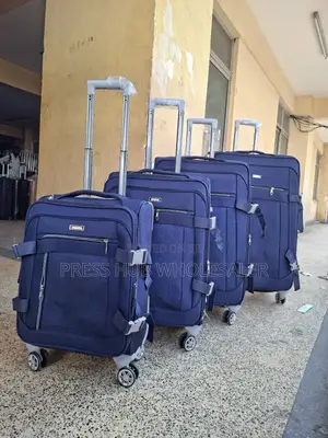 This Is a 4-in-1 Set of Blue Fabric Travel Suitcases