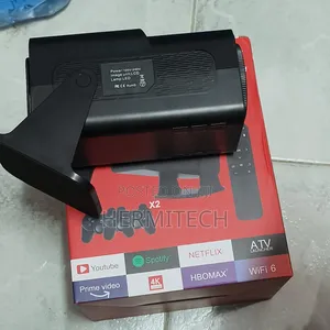 Gaming Projector With Downloaded Games and Two Gaming Consoles