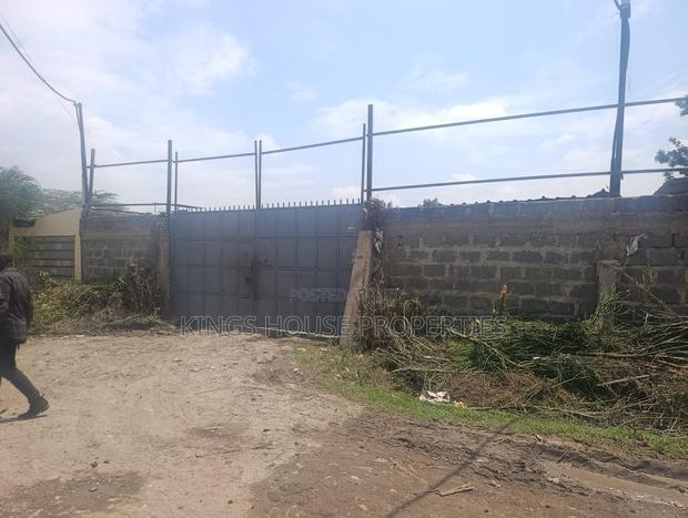 1/2 an Acre of Land Slightly Developed Touching Eastern Bypass - main view