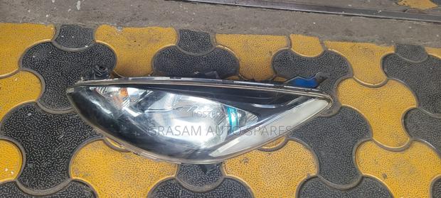 Mazda Demio 2010 Headlight Blue Shade - main view