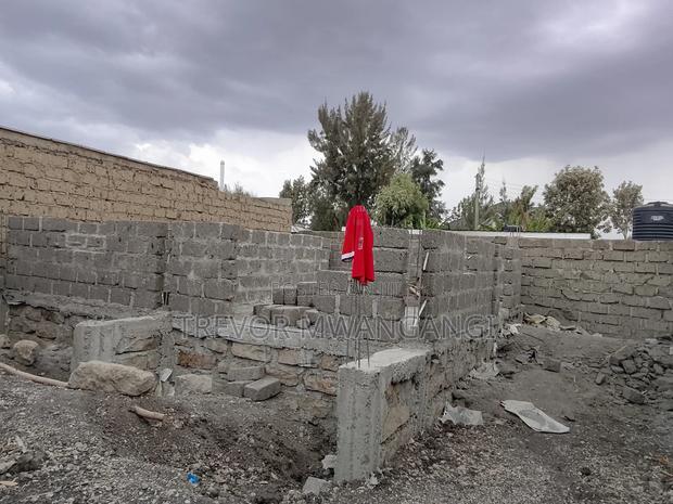 1/8 Acre of Land With 1 Bedroom Unfinished House