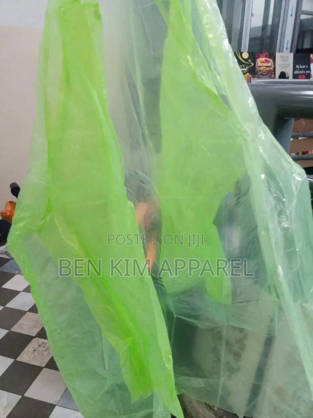 Kids Rain Coats Green, Blue, Pink, White.