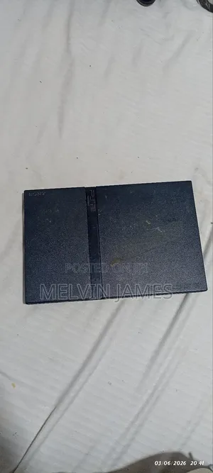 2 Playstation 2tm Consoles With 12 Games