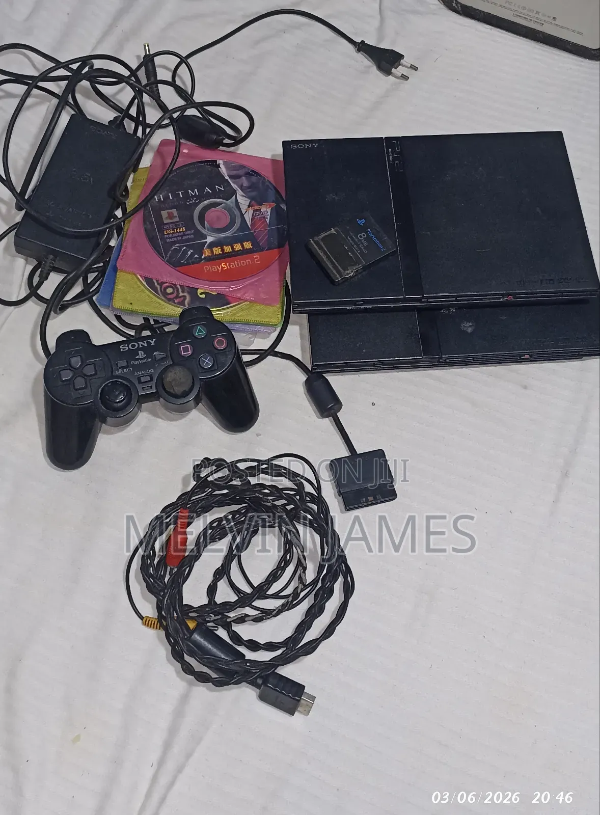 2 Playstation 2tm Consoles With 12 Games