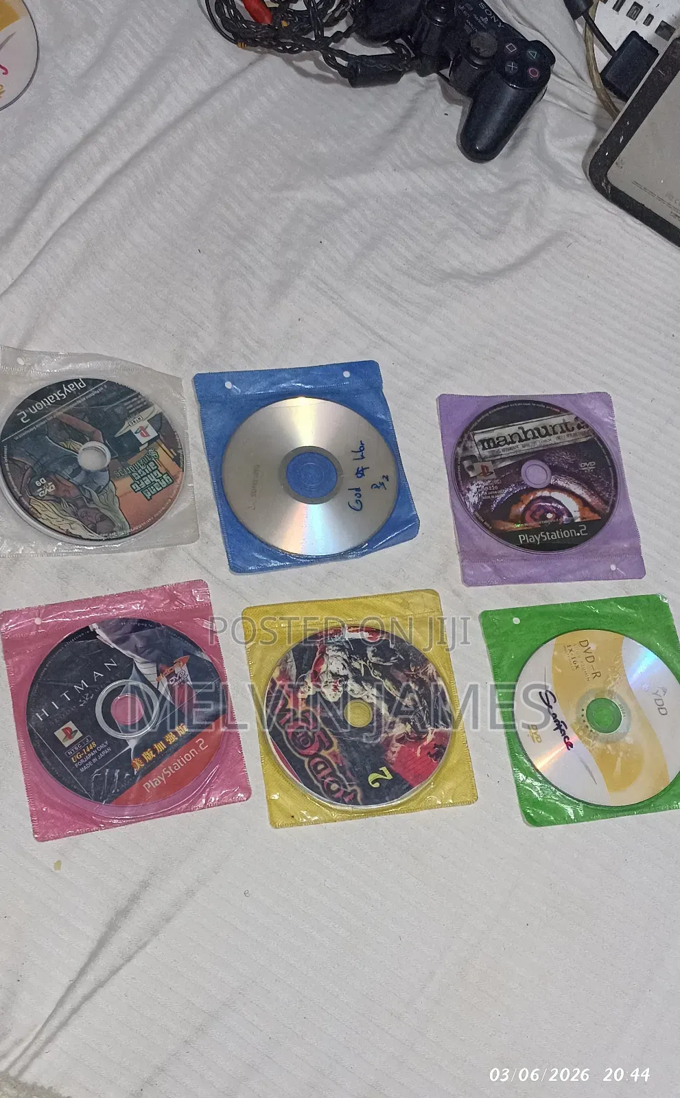 2 Playstation 2tm Consoles With 12 Games