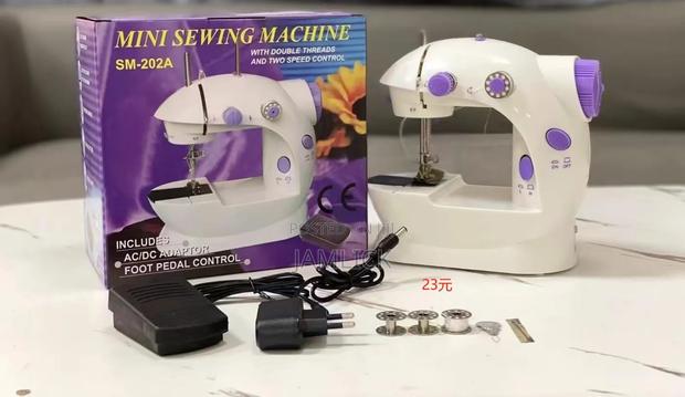 Mini Handheld Sewing Machine With Light Foot Pedal – Cr - main view