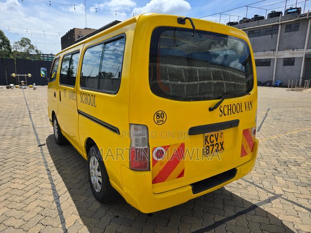 Nissan Caravan (Urvan) 2012 Yellow - thumbnail 4