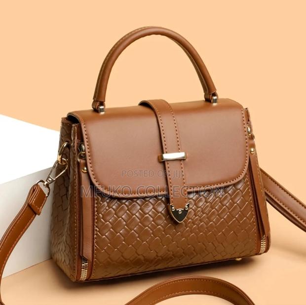 Sling Bag . Available in Black and Brown - main view