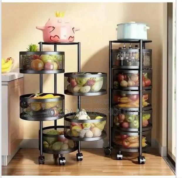 *Round Fruit Rack With Wheels(In Good Condition)* *5 Tier