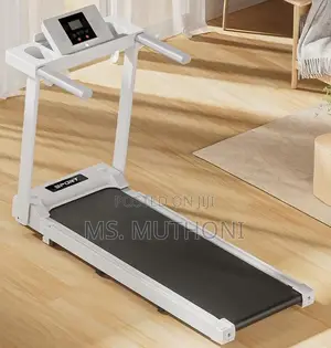 White Foldable Walking Pad / Treadmill Ft Bluetooth Connectivity.