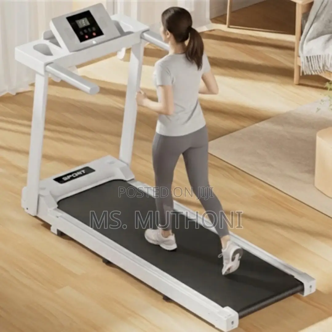 White Foldable Walking Pad / Treadmill Ft Bluetooth Connectivity.