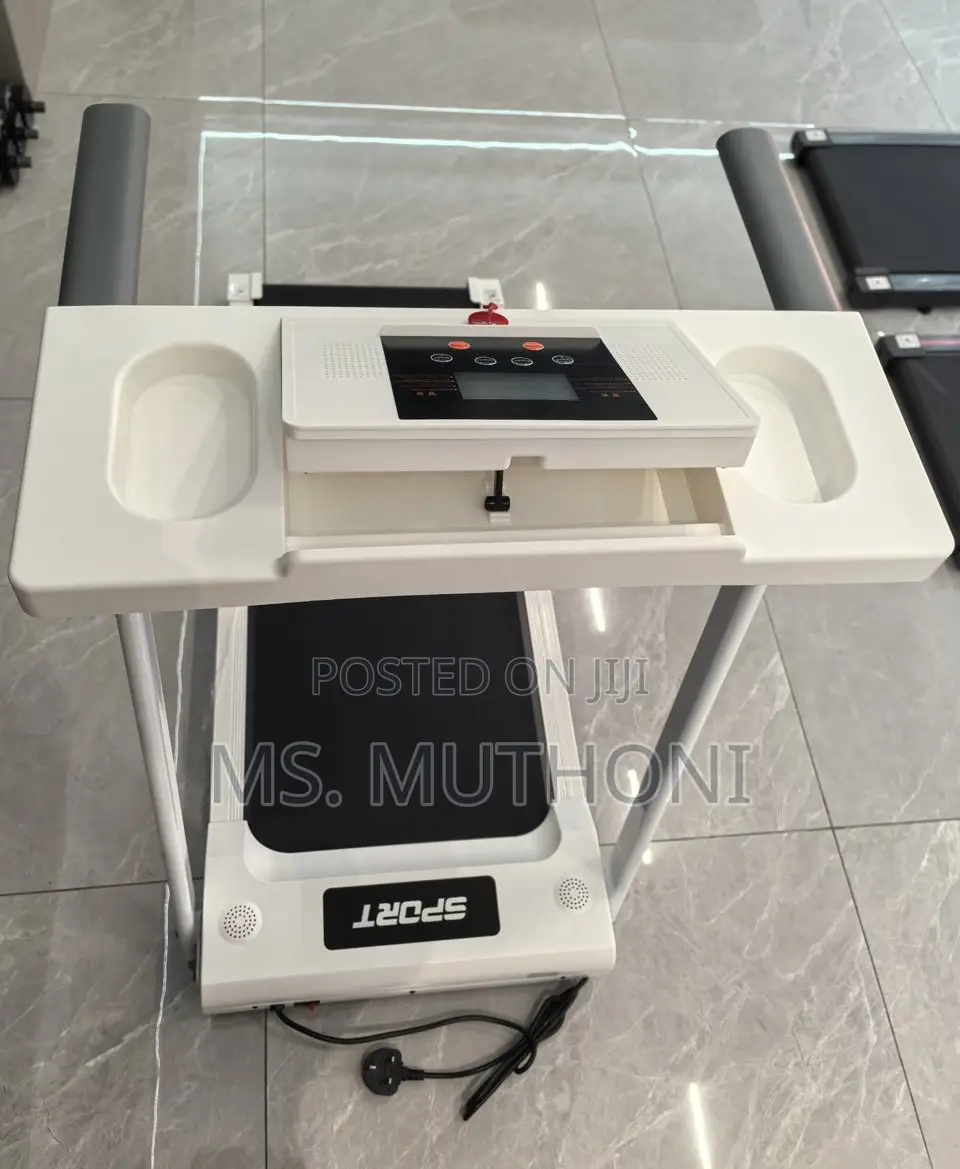 White Foldable Walking Pad / Treadmill Ft Bluetooth Connectivity.