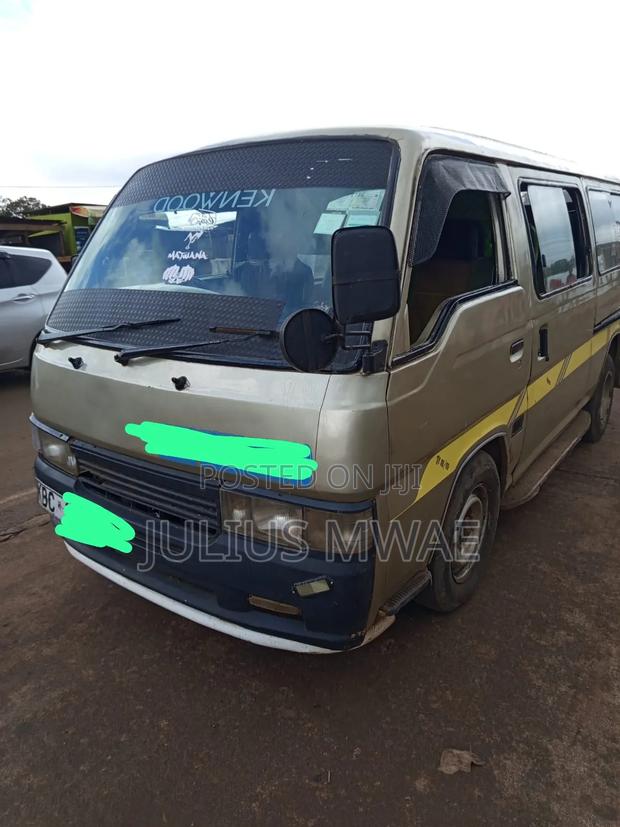Nissan Caravan (Urvan) 2009 Silver - main view