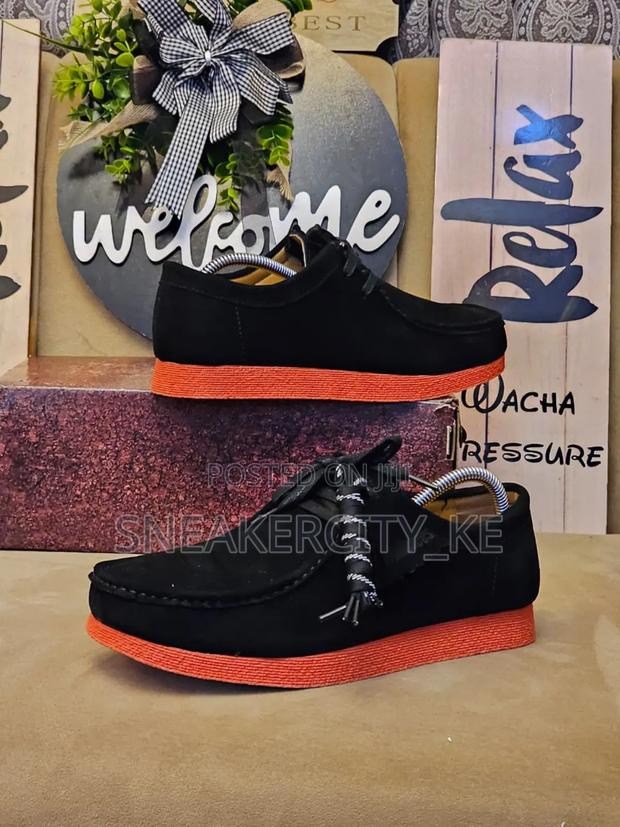 Black/Coffred Red Sole Clarks Wallabees - main view