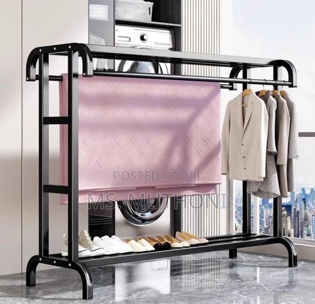 Freestanding Metal Clothes Drying Rack and Garment Organizer.
