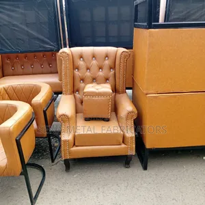 Salon King-Size Chair With Brown Pouf.