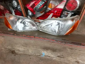 Toyota Platz Headlight Complete With Bulb And Socket