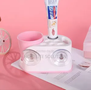 Toothbrush Holder With Toothpaste Dispenser