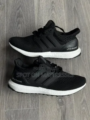 Ultraboost Adidas Sneakers Available in Grey and Black. Sizes 38-47.