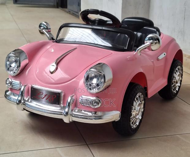 Pink Kids Electric Car (Ages 2–5 Years)
- G