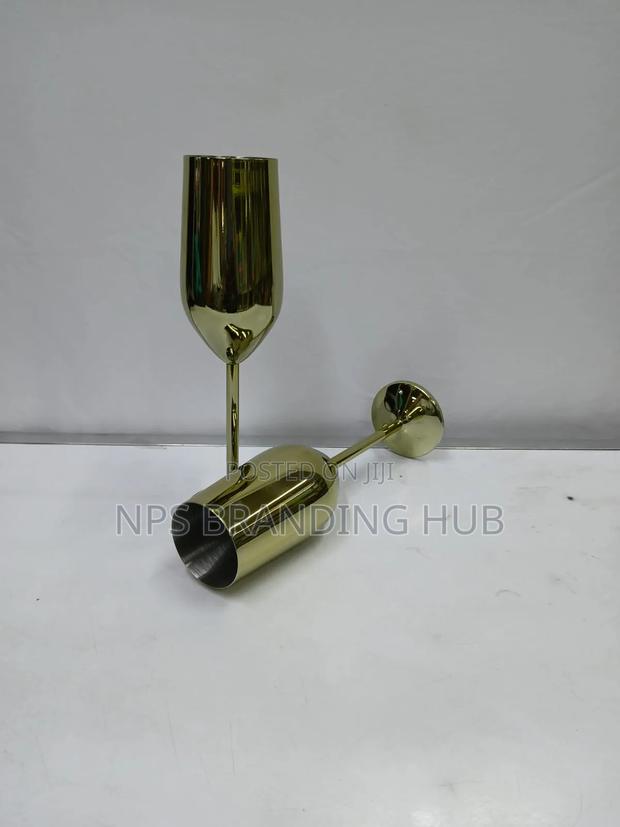 A Pair Of Gold Stainless Steel Wine Glass Eh