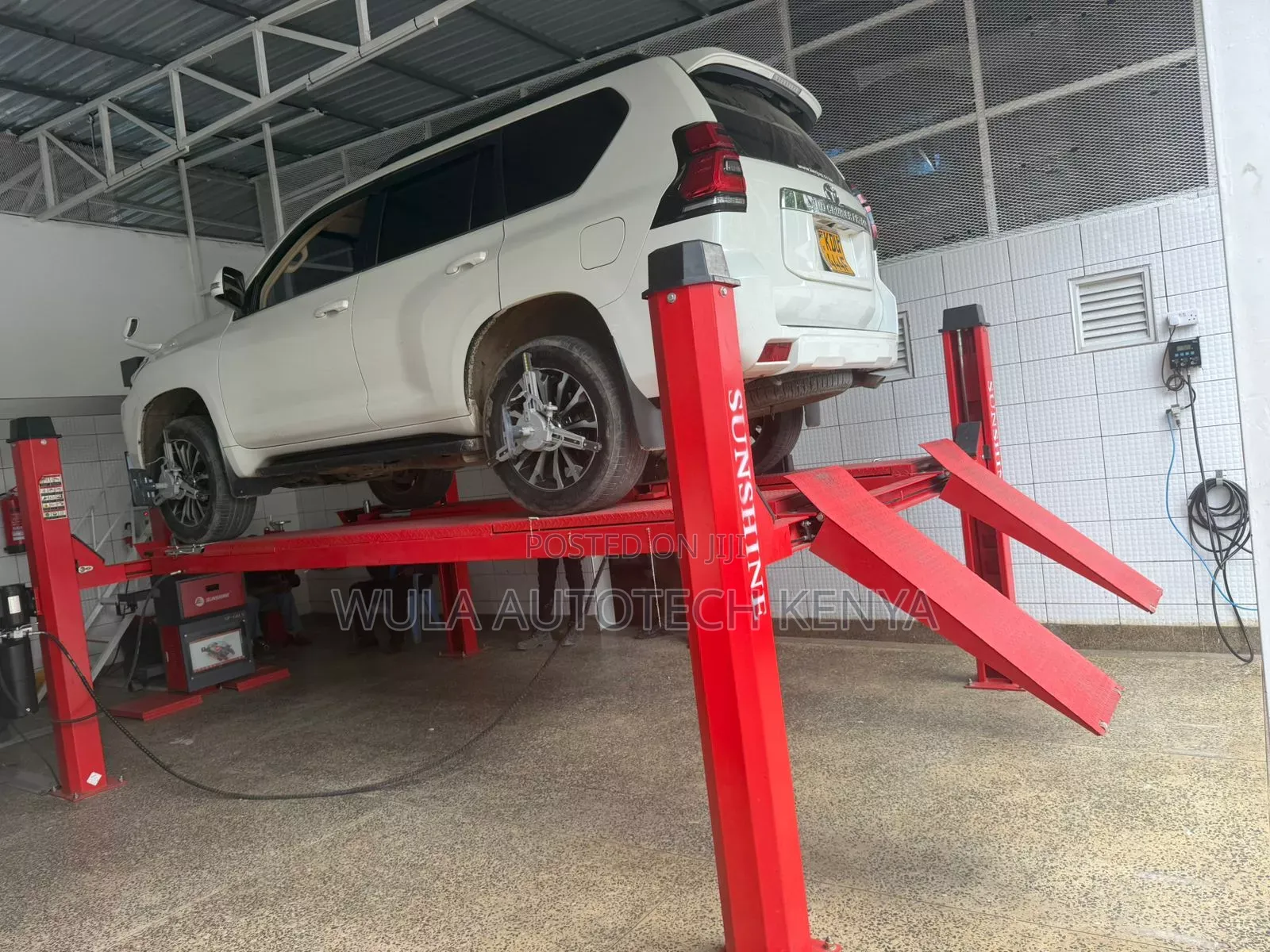 Best Design 4t Four Post Lift Machine With All Accessories Sunshine