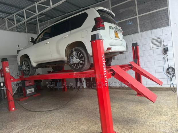 Best Design 4t Four Post Lift Machine With All Accessories Sunshine