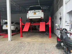 High Performance Vehicle Lift Four Post Machine Sunshine Italy