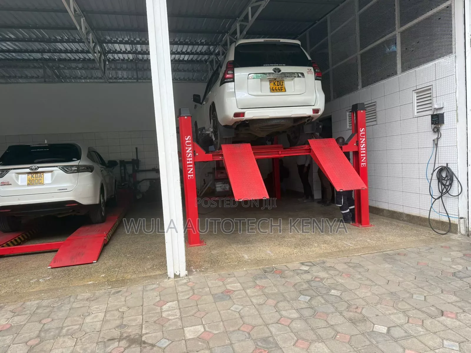 High Performance Vehicle Lift Four Post Machine Sunshine Italy