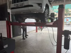 Sunshine Heavy Duty Machinery Four Post Vehicle Lift Machine