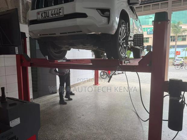 Sunshine Heavy Duty Machinery Four Post Vehicle Lift Machine