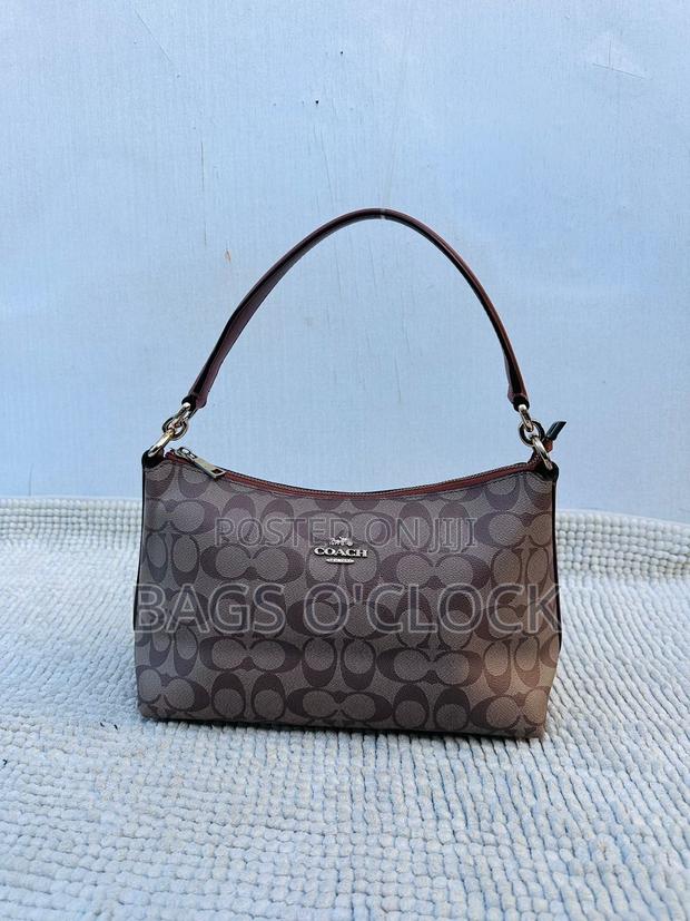 Authentic Coach Lewis Shoulder Bag in Signature Canvas