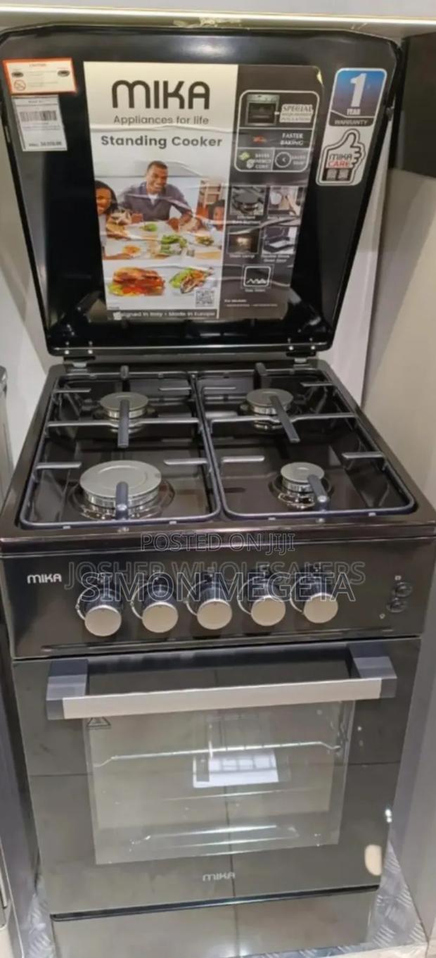 Colour Brown. New Mika Full Gas 50by60 Standing Cooker - main view