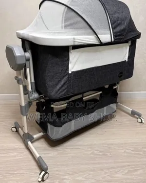 Electric Portable Rocking Bassinet/Cosleeper With Music and Remote