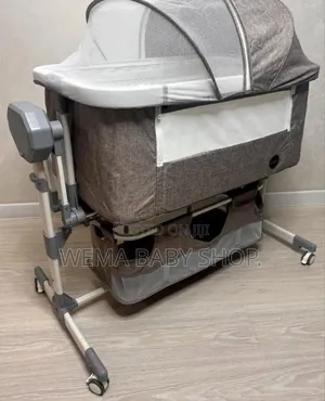 Electric Portable Rocking Bassinet/Cosleeper With Music and Remote