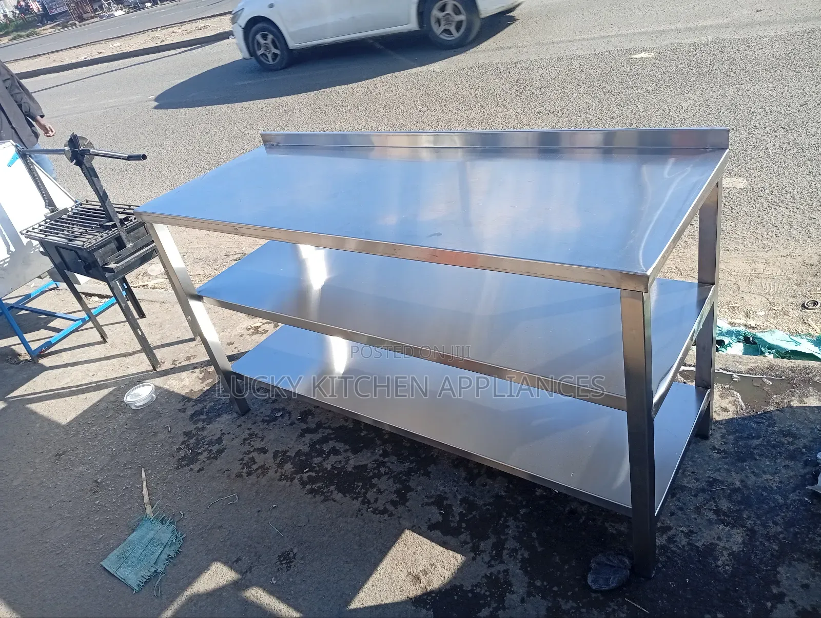 Stainless Steel Heavy Duty Working Top With Under Shelves.