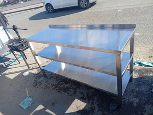 Stainless Steel Heavy Duty Working Top With Under Shelves.